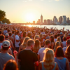 a packed concert in buffalo, new york at the water front  downtown at sunset with huge crowds and fun summer party atmosphere