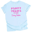 Blue 40 Years of Being Fucking Fabulous women’s birthday tee in blue, layered pink fonts with bold text, fun and cheeky 40th birthday graphic shirt