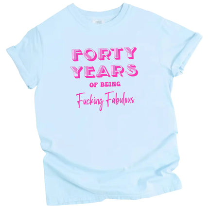 Blue 40 Years of Being Fucking Fabulous women’s birthday tee in blue, layered pink fonts with bold text, fun and cheeky 40th birthday graphic shirt