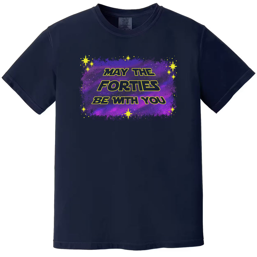 May the Forties Be With You men’s birthday t-shirt in navy, featuring bold yellow retro lettering on a blue and purple starry galaxy background, humorous milestone birthday graphic tee for men.