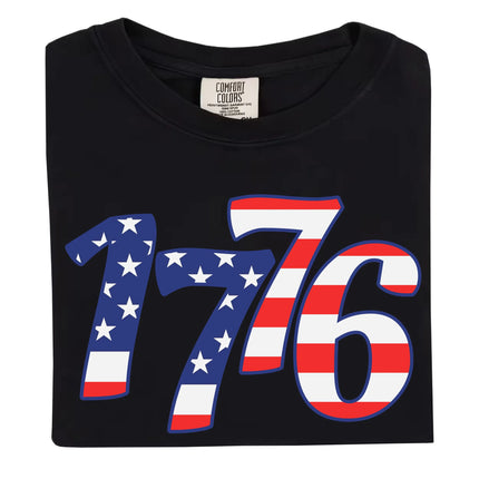 1776 patriotic t-shirt in black, featuring large bold staggered numbers filled with an American flag pattern, July 4th graphic tee for Independence Day celebrations