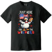 'Just Here for the Wieners’ July 4th t-shirt in black, cute goose with American flag and hot dog, humorous BBQ graphic tee.