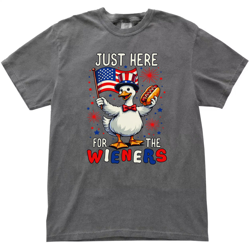 Patriotic goose graphic tee in gray, holding flag and hot dog, funny ‘Just Here for the Wieners’ Independence Day shirt.