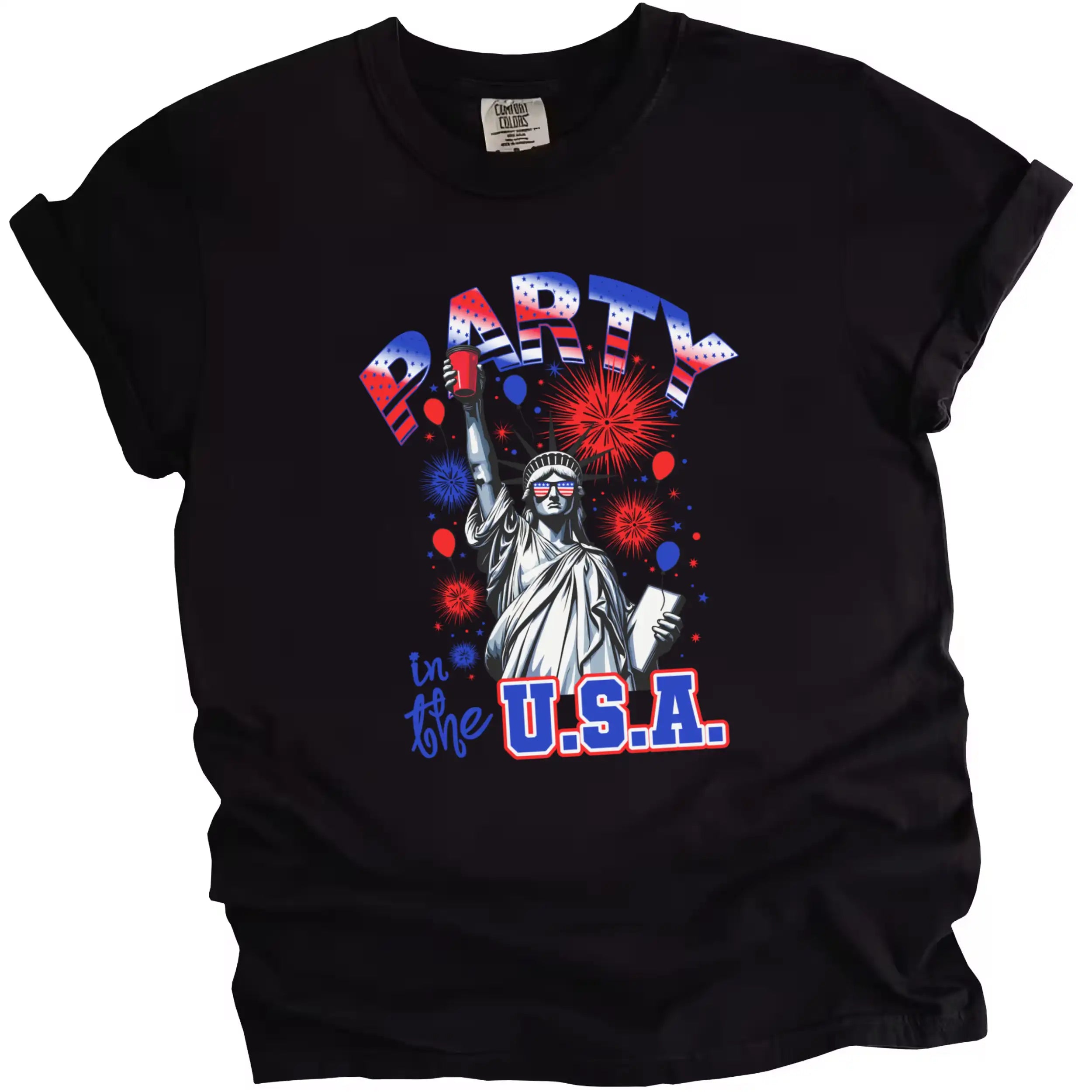 Statue of Liberty ‘Party in the USA’ t-shirt in black, Liberty holding red cup instead of torch, flag sunglasses, fireworks and star sparkles graphic tee.