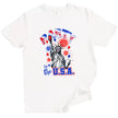 Female model wearing white ‘Party in the USA’ Statue of Liberty t-shirt outdoors, Liberty holding red cup design with fireworks and patriotic summer vibe.