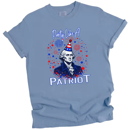 George Washington party graphic t-shirt in blue, ‘Party Like a Patriot’ design with fireworks and sparkles, fun July 4th tee.