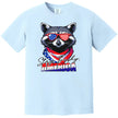 Patriotic raccoon graphic tee in light blue, ‘Stay Trashy America’ design with sunglasses and bandana, fun Independence Day shirt.