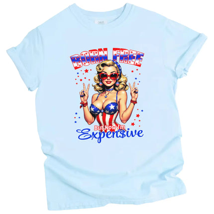 Born Free But Now I’m Expensive patriotic t-shirt in blue, retro pinup girl with patriotic styling and bold attitude, fun July 4th graphic tee.
