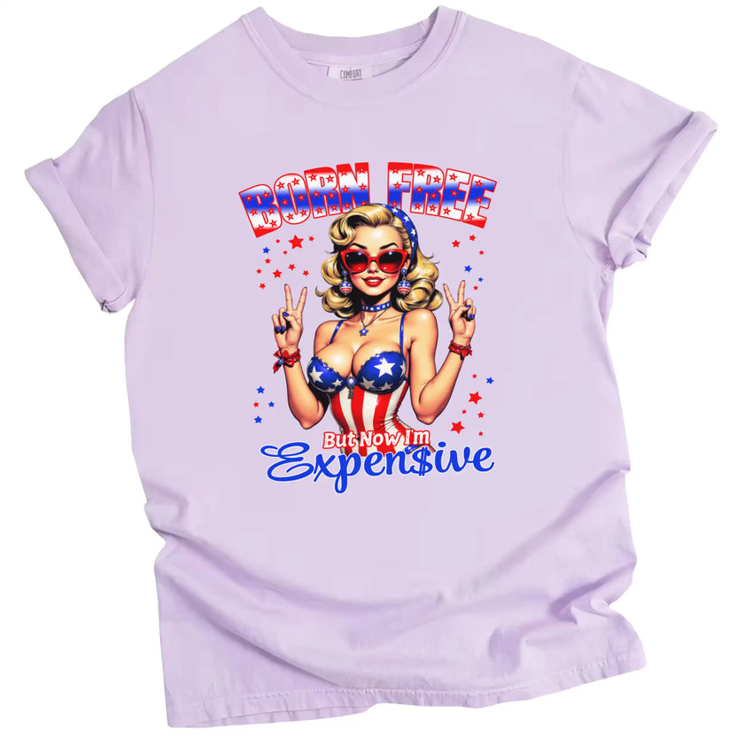 Born Free But Now I’m Expensive patriotic t-shirt in purple, glam retro pinup girl with sunglasses and patriotic outfit, bold Independence Day graphic tee