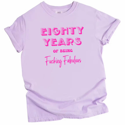 80 Years of Being Fucking Fabulous women’s birthday t-shirt in purple, layered pink mixed-font lettering, fun and cheeky milestone 80th birthday graphic tee
