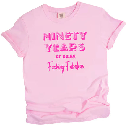 90 Years of Being Fucking Fabulous women’s birthday t-shirt in pink, bold pink mixed-font lettering, playful milestone 90th birthday graphic tee