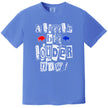 Blue Buffalo football graphic tee featuring ‘A Little Bit Louder Now’ in eye-catching magazine cutout font with a small red and blue buffalo silhouette for spirited game-day style.