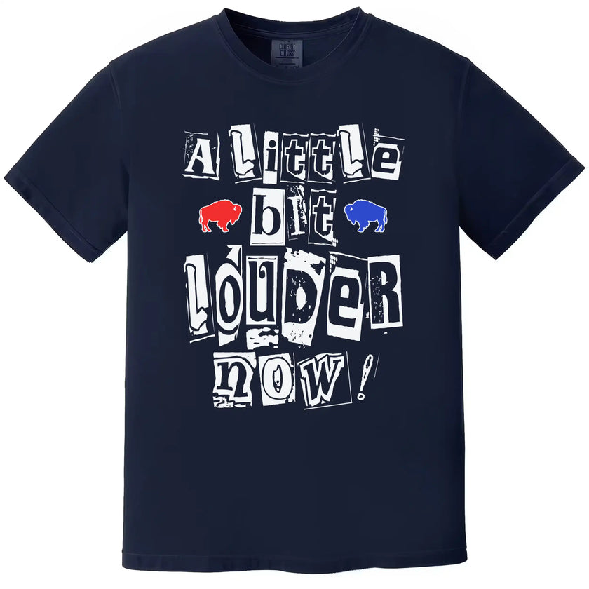 Navy Buffalo football t-shirt featuring the game-day chant ‘A Little Bit Louder Now’ in bold magazine cutout lettering with a small red and blue buffalo graphic.