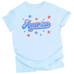 America graphic t-shirt in light blue, distressed retro lettering with red white blue colorblock design and star sparkles.