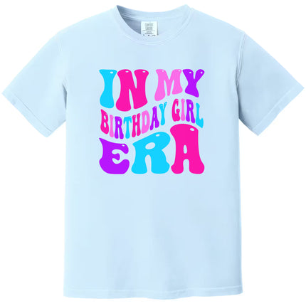 In My Birthday Girl Era women’s birthday t-shirt in blue, bold retro pink, purple, and blue lettering, fun and playful graphic tee for celebrating birthdays