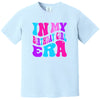 In My Birthday Girl Era women’s birthday t-shirt in blue, bold retro pink, purple, and blue lettering, fun and playful graphic tee for celebrating birthdays