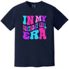 In My Birthday Girl Era women’s birthday tee in navy, big retro pink, purple, and blue letters, colorful and playful graphic birthday t-shirt for women