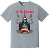 Gray “It’s My Birthday” skeleton t-shirt flat lay showcasing skeleton in party attire with confetti, perfect for birthday celebrations