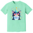 Birthday party cat graphic tee in light green, sunglasses and birthday hat cat surrounded by rainbow confetti chaos.