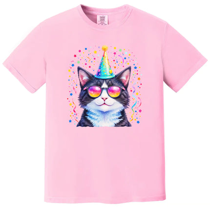 Funny birthday cat t-shirt in pink, party animal cat wearing sunglasses and hat with pastel confetti explosion design.
