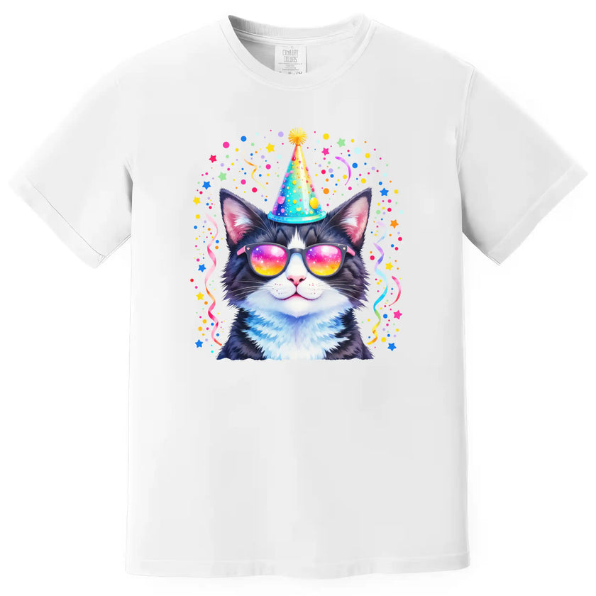 Cute party animal cat shirt in white, birthday cat wearing sunglasses and hat surrounded by pastel rainbow confetti explosion.