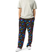 Man wearing Buffalo NY retro patterned pants with neon geometric print, colorful arcade-inspired shapes, and blue buffalo details in bold unisex style.