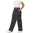 Side view of Buffalo NY patterned pants with bright neon geometric shapes, retro arcade-inspired print, and blue buffalo silhouettes in a bold all-over design.