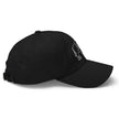 Black dad cap right side view showing blackout Buffalo silhouette embroidery with white BUF text and curved brim.