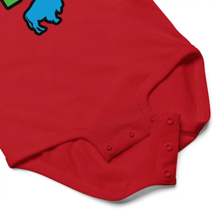 Close-up of red Buffalo Bro baby bodysuit snap closure detail for easy diaper changes and comfortable cotton baby clothing.
