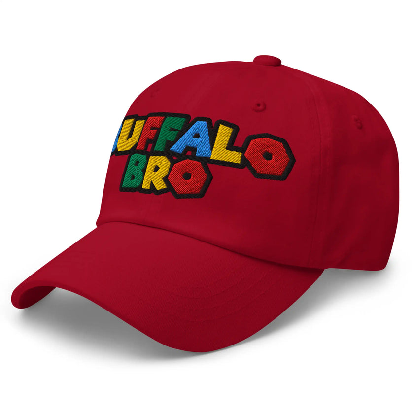Red dad hat left front angle featuring Super Buffalo Bro retro video game inspired embroidery with nostalgic 90s styling.