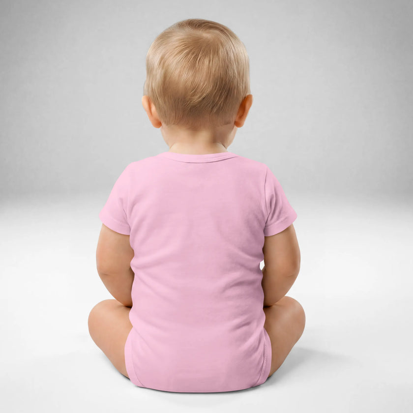 Back view of baby wearing pink Buffalo football ‘Let’s Go Buffalo’ bodysuit with soft cotton fit and snap closure detail.