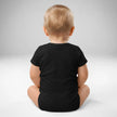 Back view of baby wearing black Buffalo football baby bodysuit with soft cotton fit and snap closure design, Buffalo themed baby apparel.