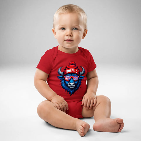 Baby wearing red Buffalo football bodysuit featuring blue buffalo head graphic with striped sunglasses and Buffalo beanie design, front view baby outfit