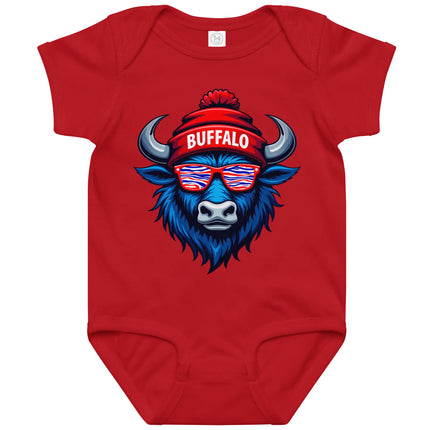 Red Buffalo football baby bodysuit featuring blue buffalo head wearing striped sunglasses and winter beanie with ‘Buffalo’ text, cute Buffalo game day baby outfit.