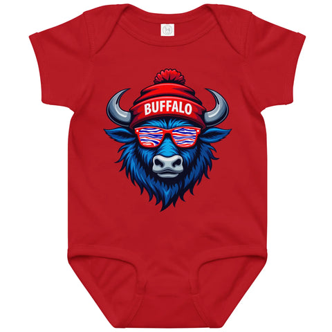 Red Buffalo football baby bodysuit featuring blue buffalo head wearing striped sunglasses and winter beanie with ‘Buffalo’ text, cute Buffalo game day baby outfit.