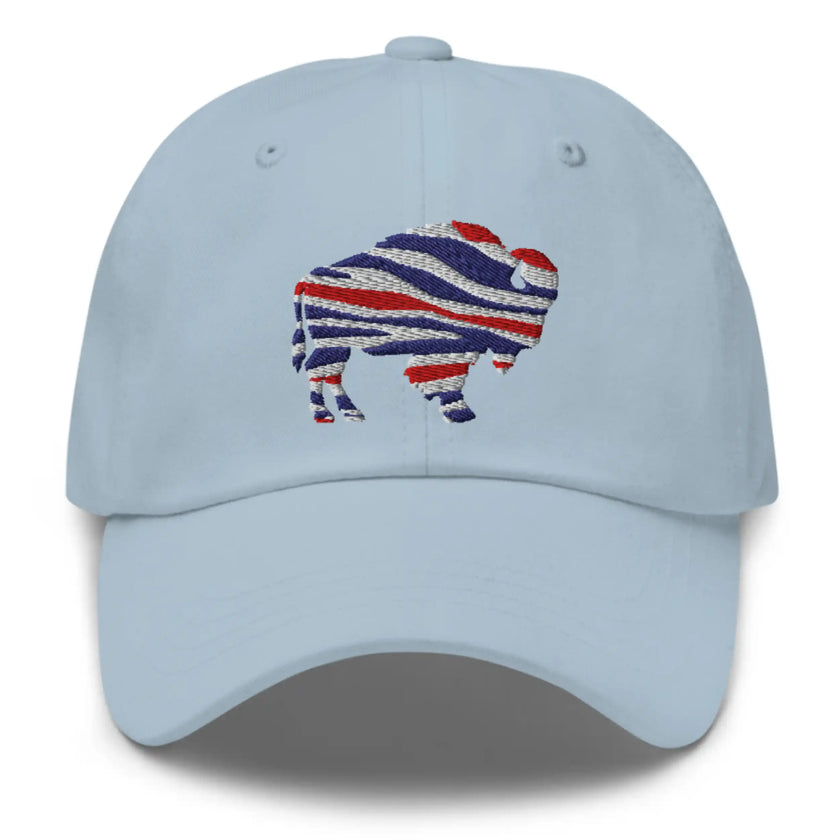 Light blue dad hat with embroidered Buffalo silhouette in red white and blue football team color stripes, casual Buffalo fan hat.