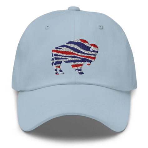 Light blue dad hat with embroidered Buffalo silhouette in red white and blue football team color stripes, casual Buffalo fan hat.