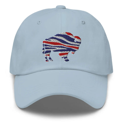 Light blue dad hat with embroidered Buffalo silhouette in red white and blue football team color stripes, casual Buffalo fan hat.