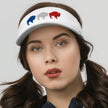 Woman wearing a white Buffalo golf visor with three embroidered buffalo silhouettes in red white and blue, a stylish athletic accessory for outdoor days.