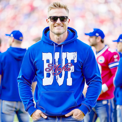 Male model wearing blue Buffalo football streetwear hoodie standing on the field at a Buffalo football game
