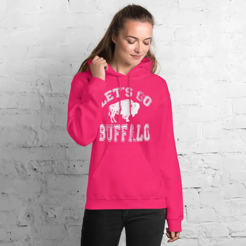 Hot pink Let’s Go Buffalo women’s football hoodie with bold white lettering and buffalo graphic. Bold Buffalo  hoodie for women showing team spirit.