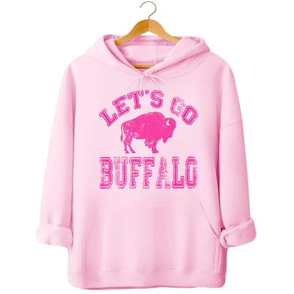 Pink Buffalo football hoodie featuring distressed hot pink ‘Let’s Go Buffalo’ varsity lettering and buffalo silhouette design, feminine Buffalo game day apparel.