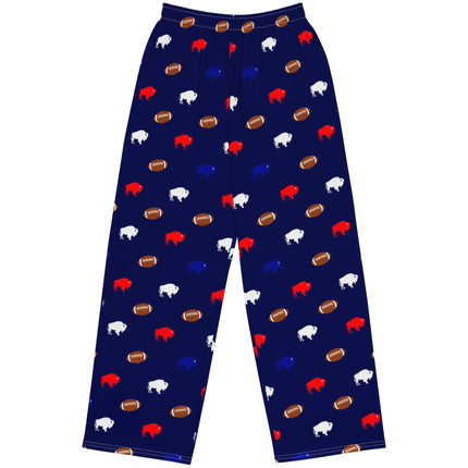 Flat lay of navy blue wide leg lounge pants featuring repeating red white and blue buffalo silhouettes with brown footballs in a playful Buffalo football pattern.