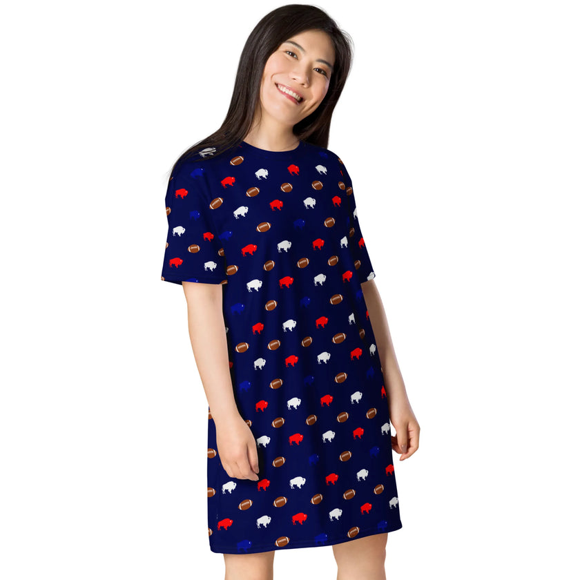 Woman posing in oversized Buffalo football sleep dress featuring fun Buffalo pattern with red blue white buffaloes and brown footballs in cozy loungewear style.