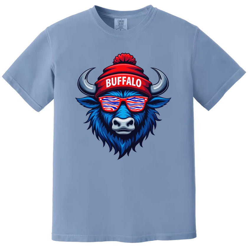 Buffalo football t-shirt in light blue, blue buffalo mascot wearing red white blue striped sunglasses and puffball Buffalo beanie.