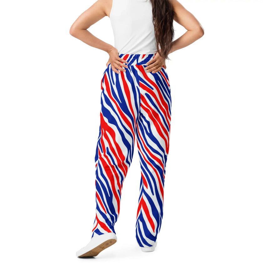 Back view of woman wearing Buffalo fan joggers with signature football stripe pattern, premium lightweight design and bold Buffalo-inspired style.
