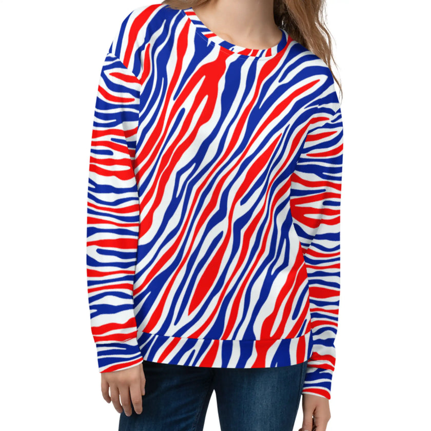 Woman wearing a signature Buffalo football stripes crewneck sweatshirt featuring a unique red white and blue all-over pattern, stylish fan fashion with bold hometown energy.