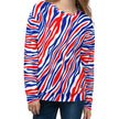 Woman wearing a signature Buffalo football stripes crewneck sweatshirt featuring a unique red white and blue all-over pattern, stylish fan fashion with bold hometown energy.