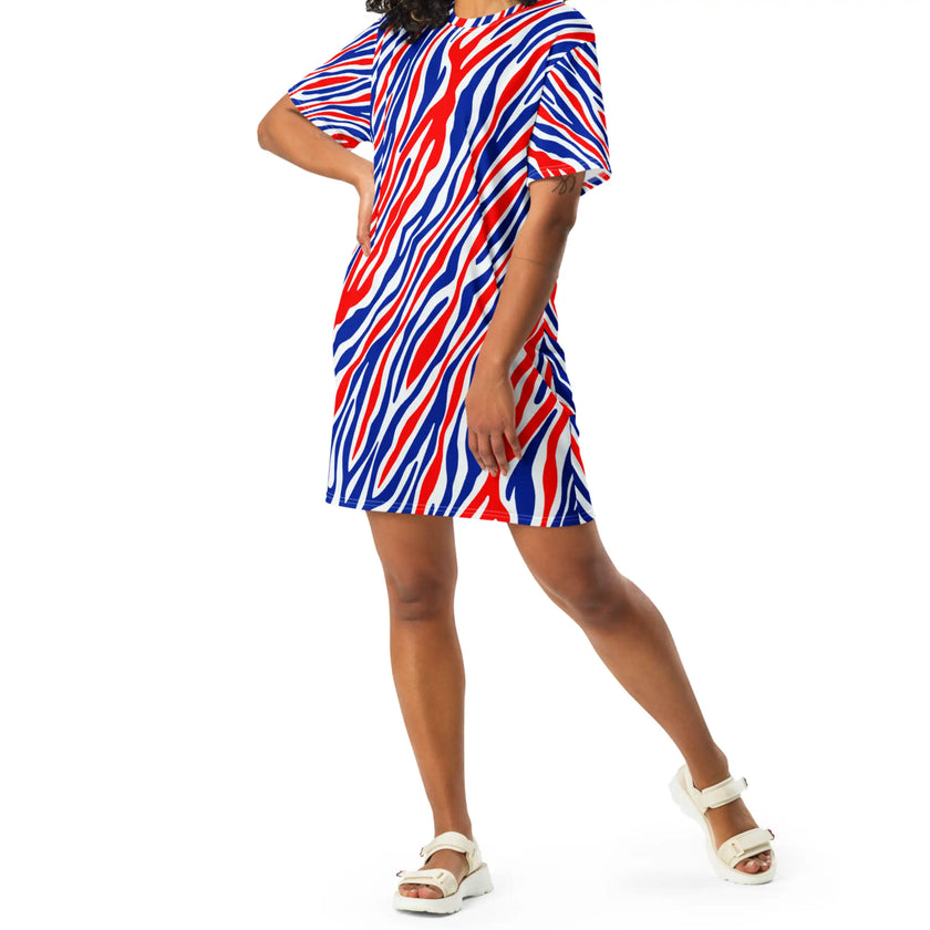 Woman posing in a signature Buffalo football t-shirt dress featuring the original red white and blue stripe pattern, bold fan fashion made to turn heads.