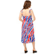 Back view of woman wearing flowing chiffon slip dress featuring signature Buffalo stripe pattern, elegant silhouette with vibrant red, white, and blue design.